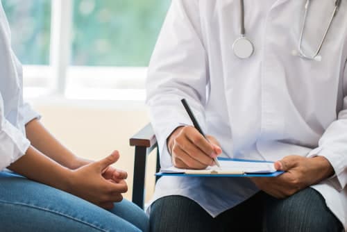 doctor speaking to patient about specialized programs offered at Worcester outpatient center